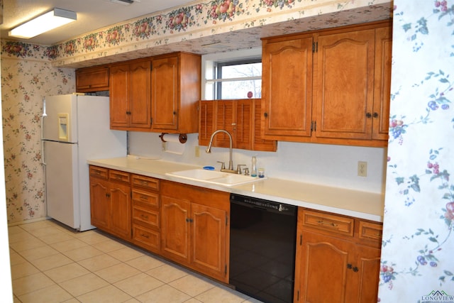 kitchen with sink, light tile patterned floors, white fridge with ice dispenser, and black dishwasher