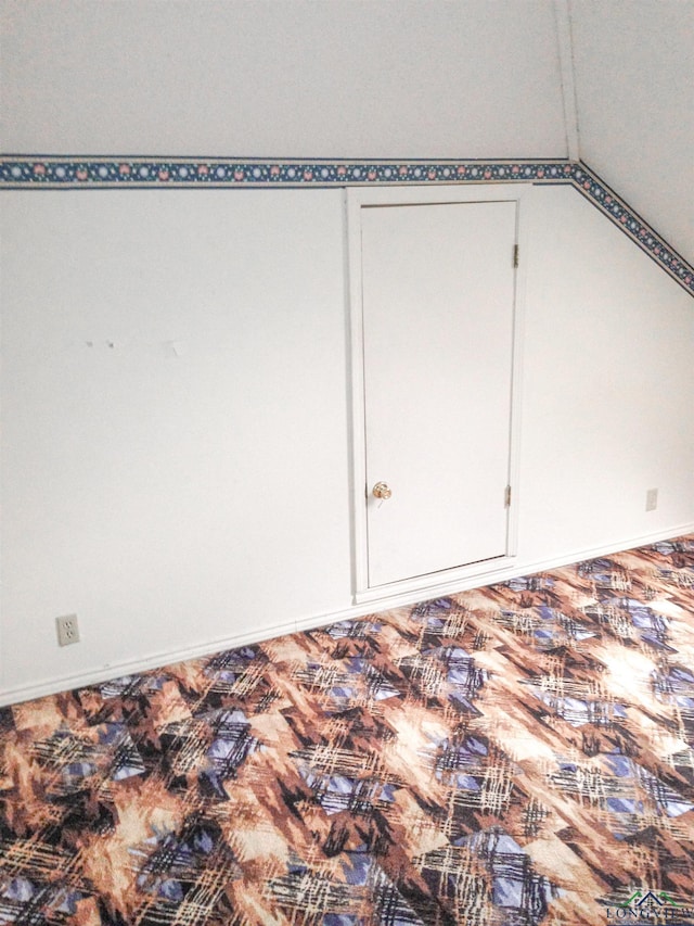 1204-1206 Brandywine, Longview, TX 75601 - unfurnished room with lofted ceiling