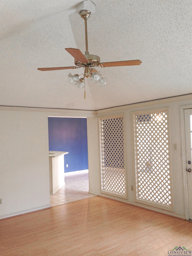 1204-1206 Brandywine, Longview, TX 75601 - empty room featuring a textured ceiling, ceiling fan, and wood finished floors