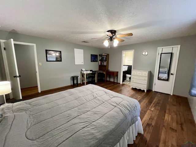 1523 Young St, Henderson, TX 75654 - bedroom featuring ceiling fan, wood finished floors, visible vents, and a textured ceiling