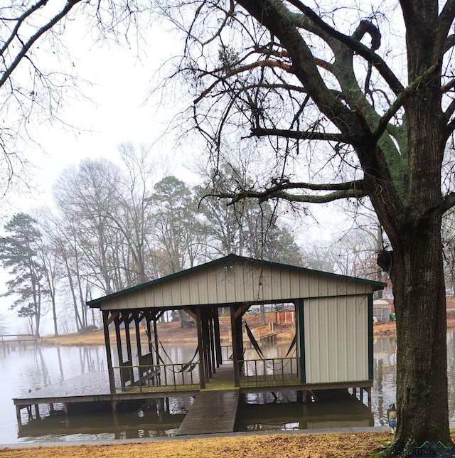 dock area featuring a water view