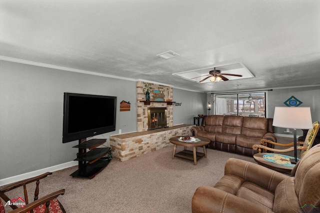 carpeted living room with ornamental molding, a stone fireplace, and ceiling fan