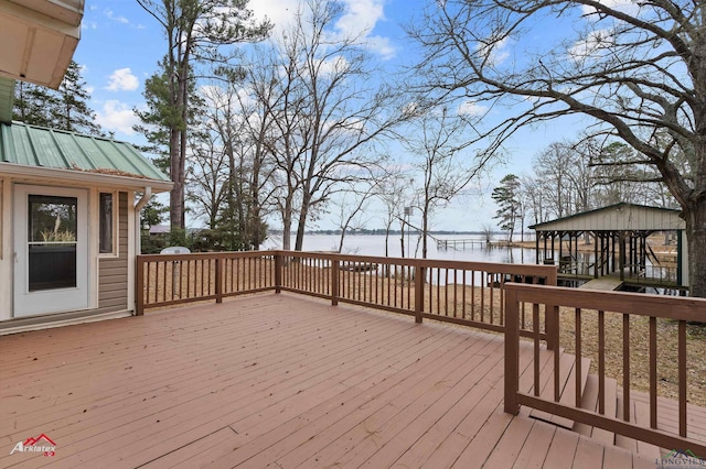 wooden terrace with a water view