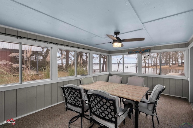 sunroom / solarium with ceiling fan