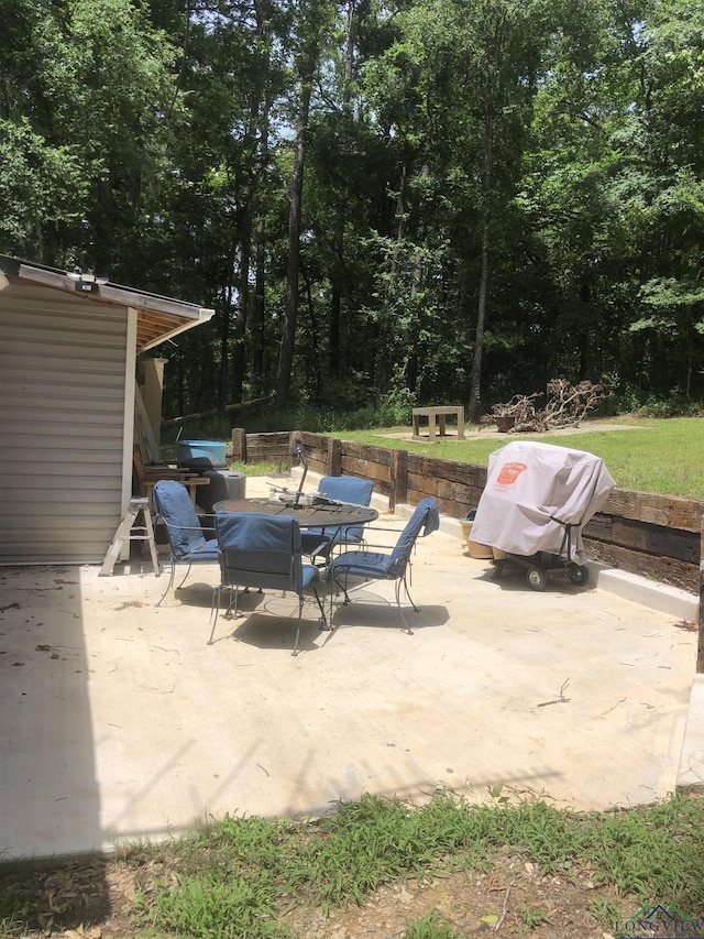 2408 Blairs Landing Rd, Karnack, TX 75661 - view of patio / terrace with outdoor dining space and area for grilling