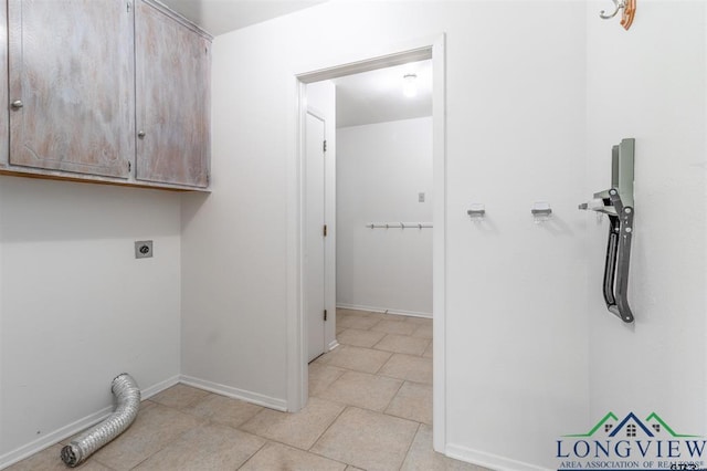 354 Royal Cir, Whitehouse, TX 75791 - washroom featuring cabinet space, electric dryer hookup, and light tile patterned flooring
