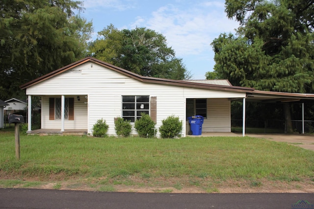 403 N Foster, Linden, TX 75563 - view of front of property featuring a front yard, a carport, and a porch