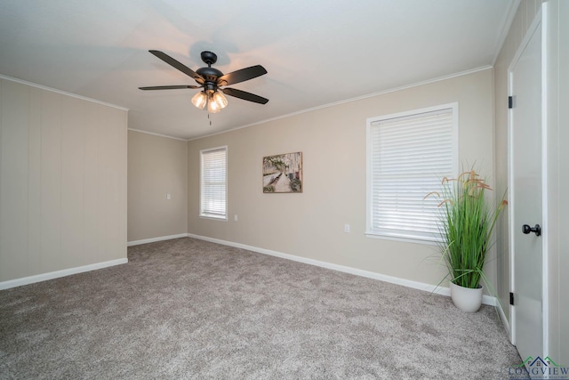 3697 N White Oak Rd, Gladewater, TX 75647 - empty room featuring carpet, a ceiling fan, baseboards, and crown molding