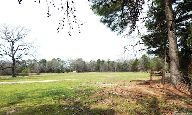 view of property's community with a lawn