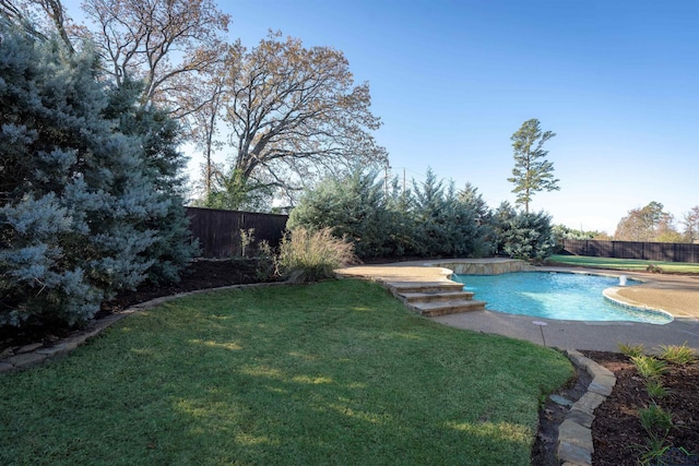 view of pool with a fenced in pool, fence private yard, and a lawn