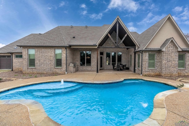 view of swimming pool with a fenced in pool and a patio