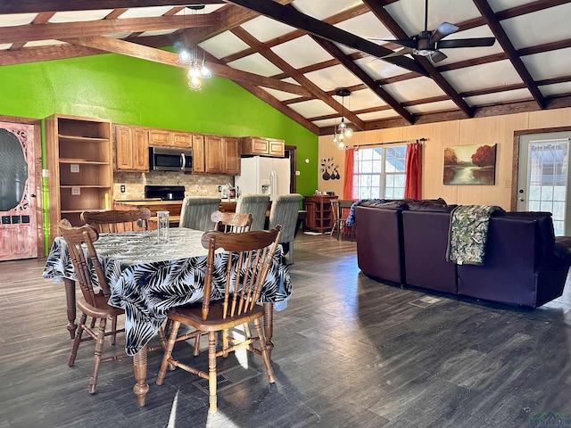 dining area featuring high vaulted ceiling, ceiling fan, and dark wood-type flooring