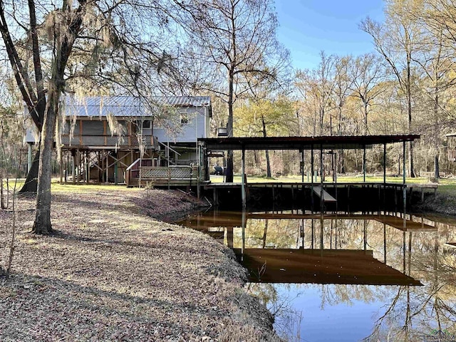 dock area with a water view