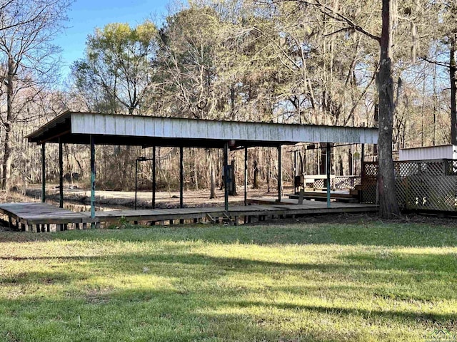 view of home's community featuring a lawn