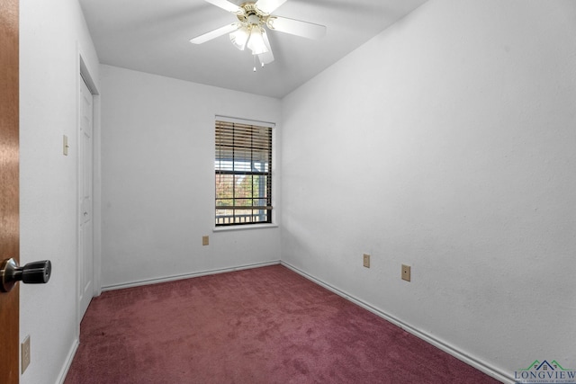 spare room with carpet and ceiling fan