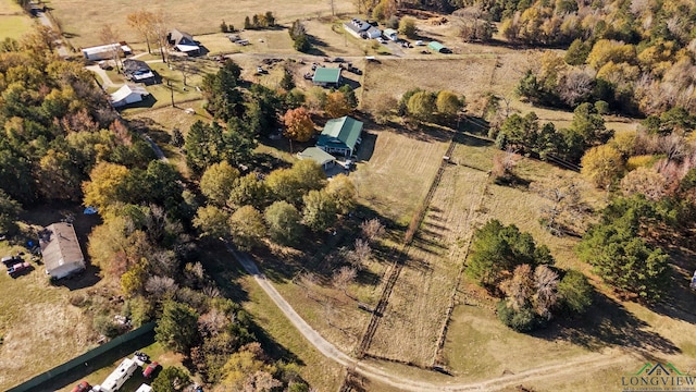 birds eye view of property featuring a rural view