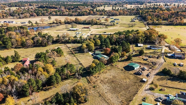 birds eye view of property featuring a rural view