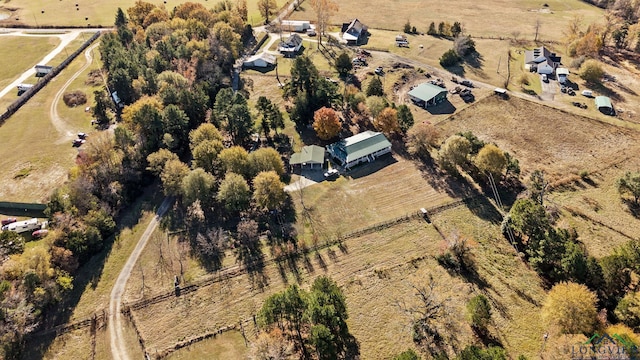 birds eye view of property featuring a rural view