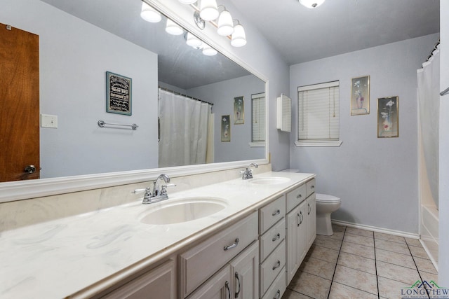 full bathroom featuring toilet, shower / tub combo, vanity, and tile patterned floors