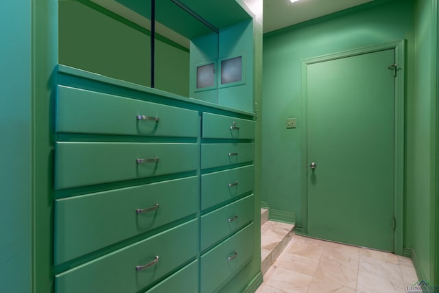 1228 Hillcrest Dr, Longview, TX 75601 - interior space featuring marble look tile flooring