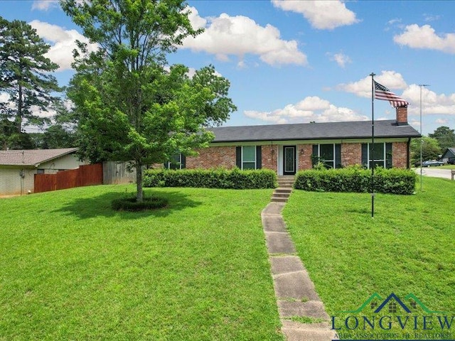 1009 Sequoyah Ln, Longview, TX 75605 - single story home featuring brick siding and a chimney