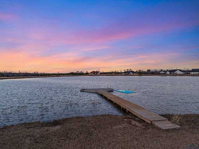 view of dock with a water view