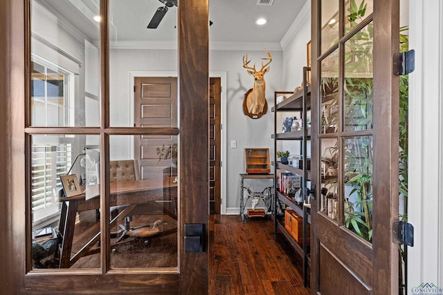 office area featuring ornamental molding, dark wood-type flooring, and ceiling fan