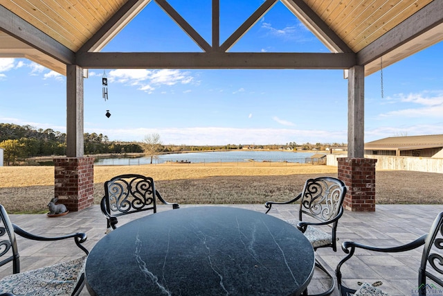 view of patio featuring a water view