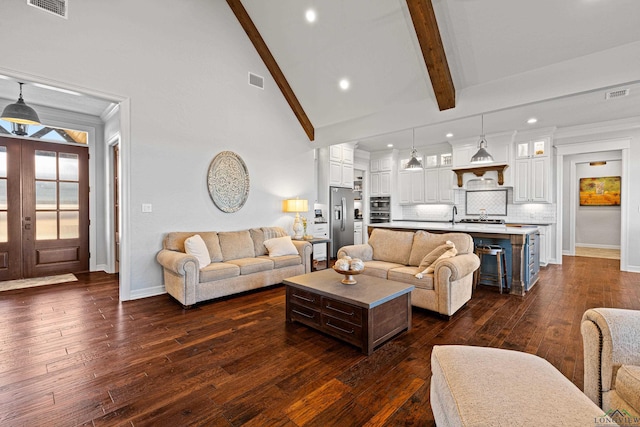 living room with dark hardwood / wood-style flooring, high vaulted ceiling, french doors, and beamed ceiling