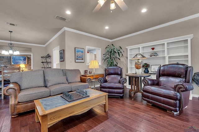 living room featuring ornamental molding, ceiling fan with notable chandelier, and dark wood-type flooring