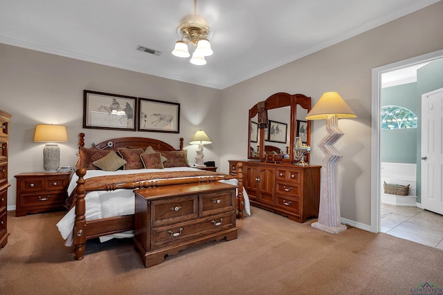 bedroom with ceiling fan, light colored carpet, and ornamental molding