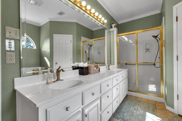 bathroom with crown molding, tile patterned flooring, vanity, and an enclosed shower