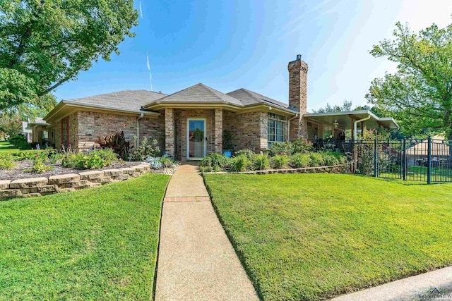 single story home with a front yard