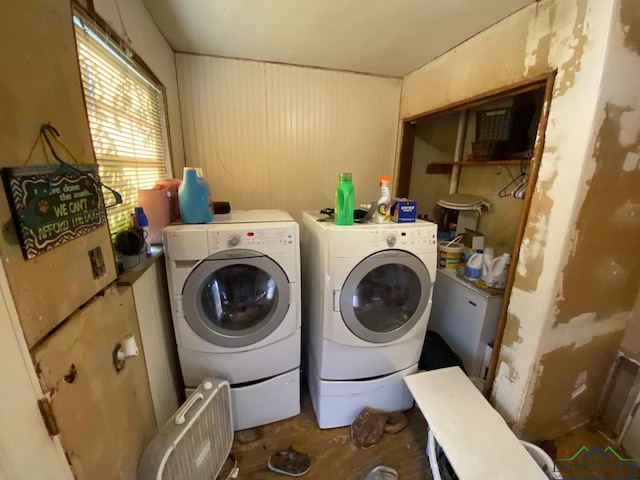 washroom with washer and dryer