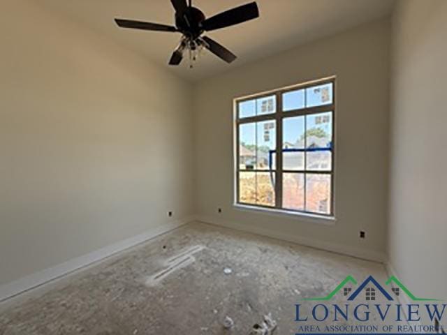 208 Lafoy Ln, Hallsville, TX 75650 - spare room featuring baseboards and a ceiling fan