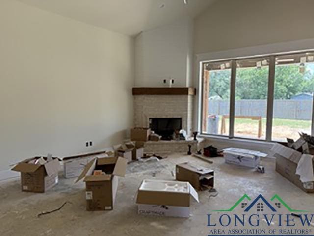 208 Lafoy Ln, Hallsville, TX 75650 - living room with high vaulted ceiling and a fireplace