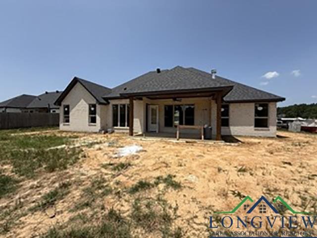 208 Lafoy Ln, Hallsville, TX 75650 - back of property with a patio and ceiling fan