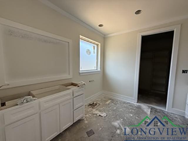 208 Lafoy Ln, Hallsville, TX 75650 - bathroom with baseboards and crown molding