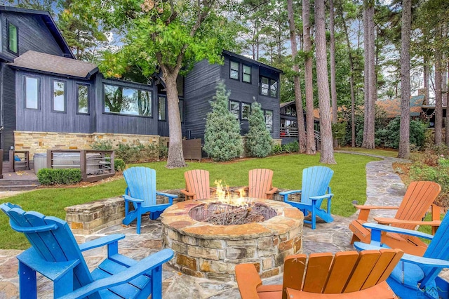 view of patio featuring a fire pit