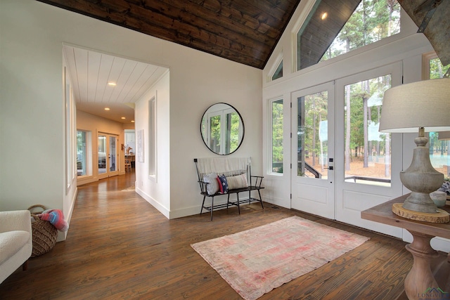 entrance foyer with wood ceiling, french doors, high vaulted ceiling, and dark wood-type flooring