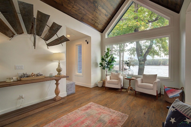 living area with high vaulted ceiling, dark hardwood / wood-style flooring, wooden ceiling, and a water view