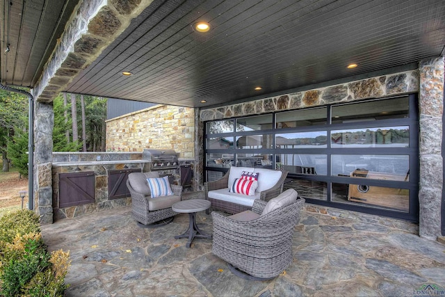 view of patio / terrace with a grill and area for grilling