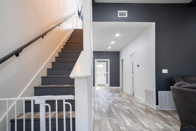 foyer with light wood-type flooring