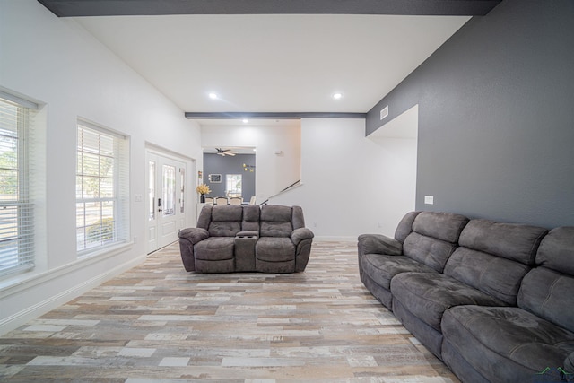 living room featuring ceiling fan, french doors, and light hardwood / wood-style floors