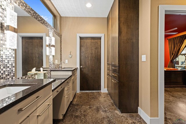 bathroom with vanity and decorative backsplash