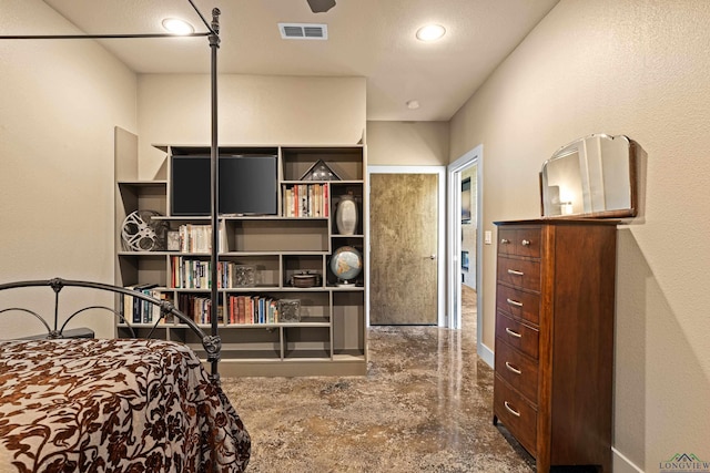 bedroom with concrete floors