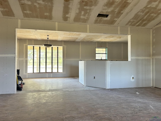 spare room featuring a wealth of natural light