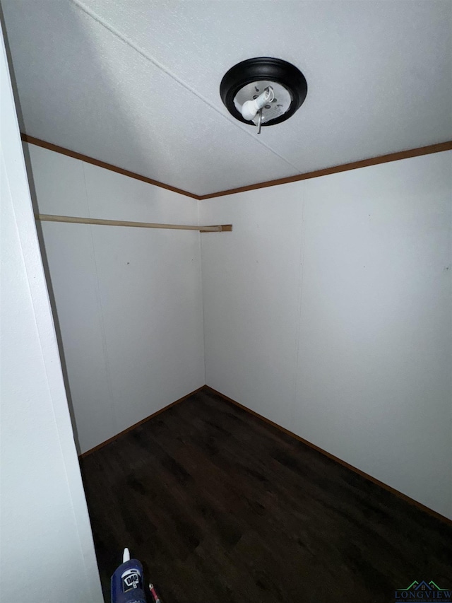 12700 2184 D, Tatum, TX 75691 - empty room featuring dark wood finished floors