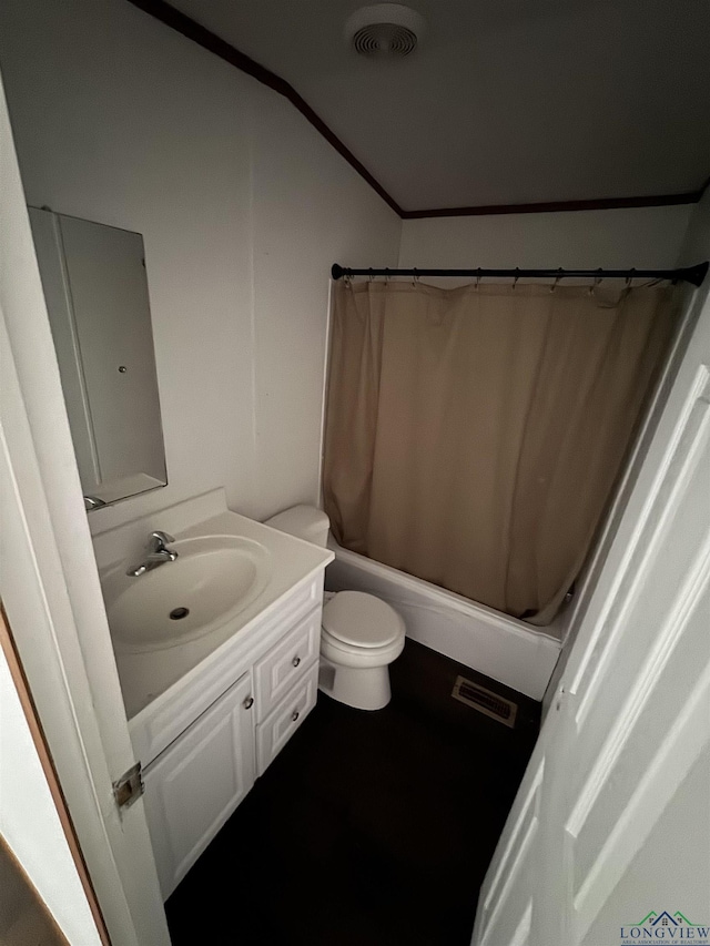 12700 2184 D, Tatum, TX 75691 - bathroom featuring toilet, vanity, shower / bath combination with curtain, and ornamental molding