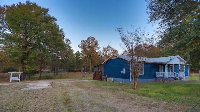 view of home's exterior featuring a yard